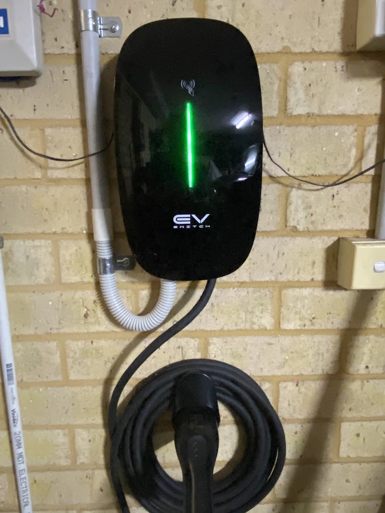 EV Switch charger, brick garage