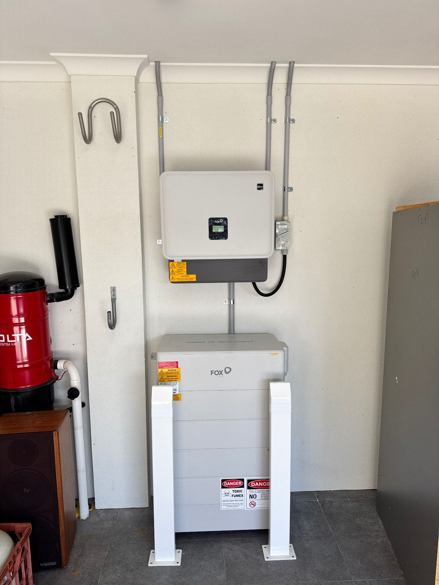 Fox ESS KH10 hybrid inverter and 42kWh battery installed neatly in a Perth garage