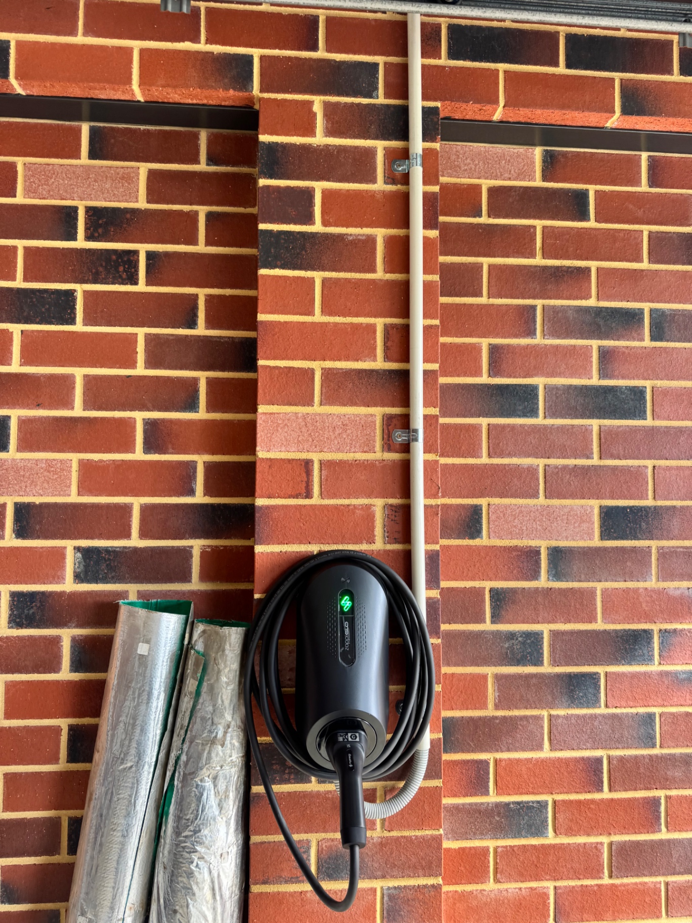 Zappi GLO on red brick