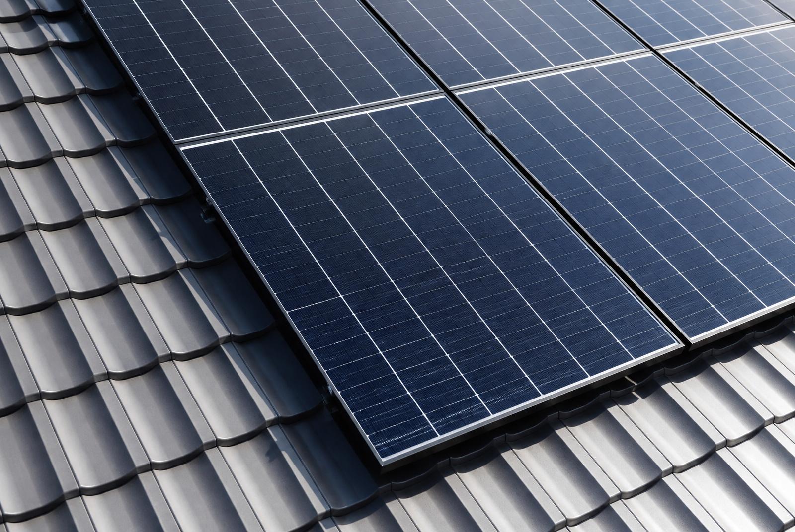 Monocrystalline solar panels on a modern Perth tile roof